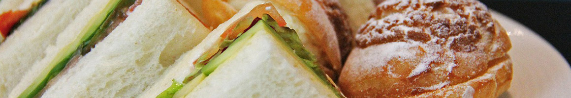 Eating Deli Sandwich at Homefront Deli restaurant in New York, NY.